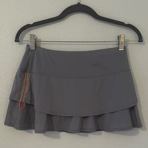 Lucky in Love Charcoal Tennis Skirt with Coral Detail